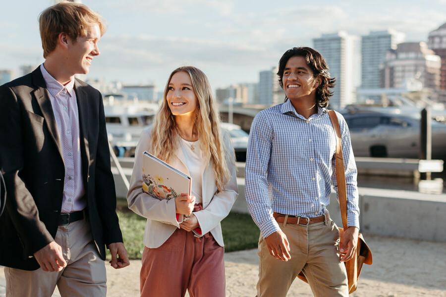 Three PBA students walk near the intercoastal waterway in 西<a href='http://ourdst.roomarea1.net'>推荐全球最大网赌正规平台欢迎您</a>.