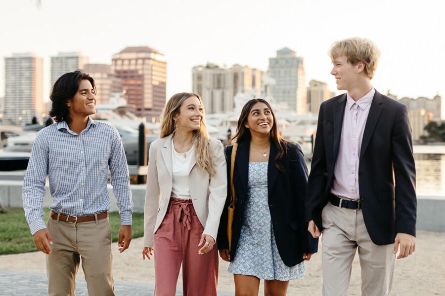 Students from the business administration BSBA program walk along the intercoastal in 西<a href='http://ourdst.roomarea1.net'>推荐全球最大网赌正规平台欢迎您</a>.